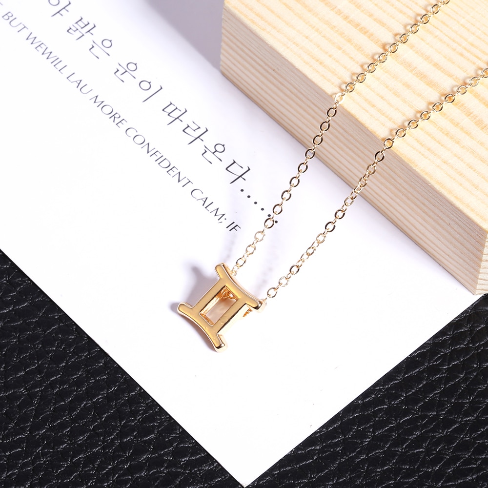 Collier signe Collier signe