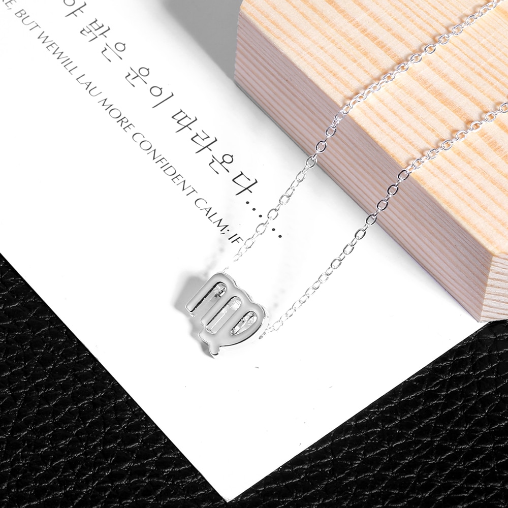Collier signe Collier signe